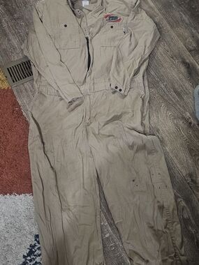 Classified tan work coveralls with small logo